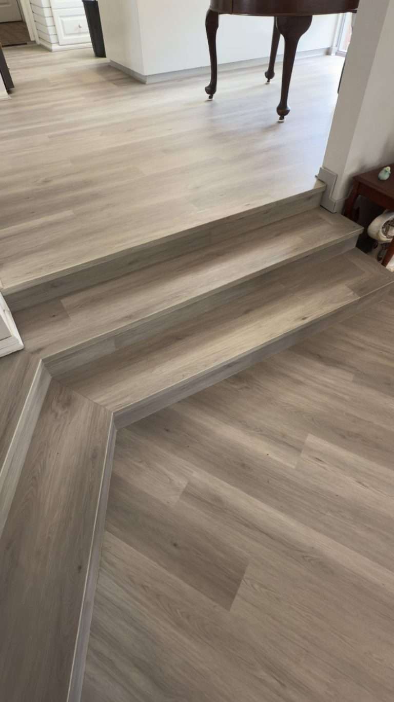 Unique stairs after having hybrid flooring installed.