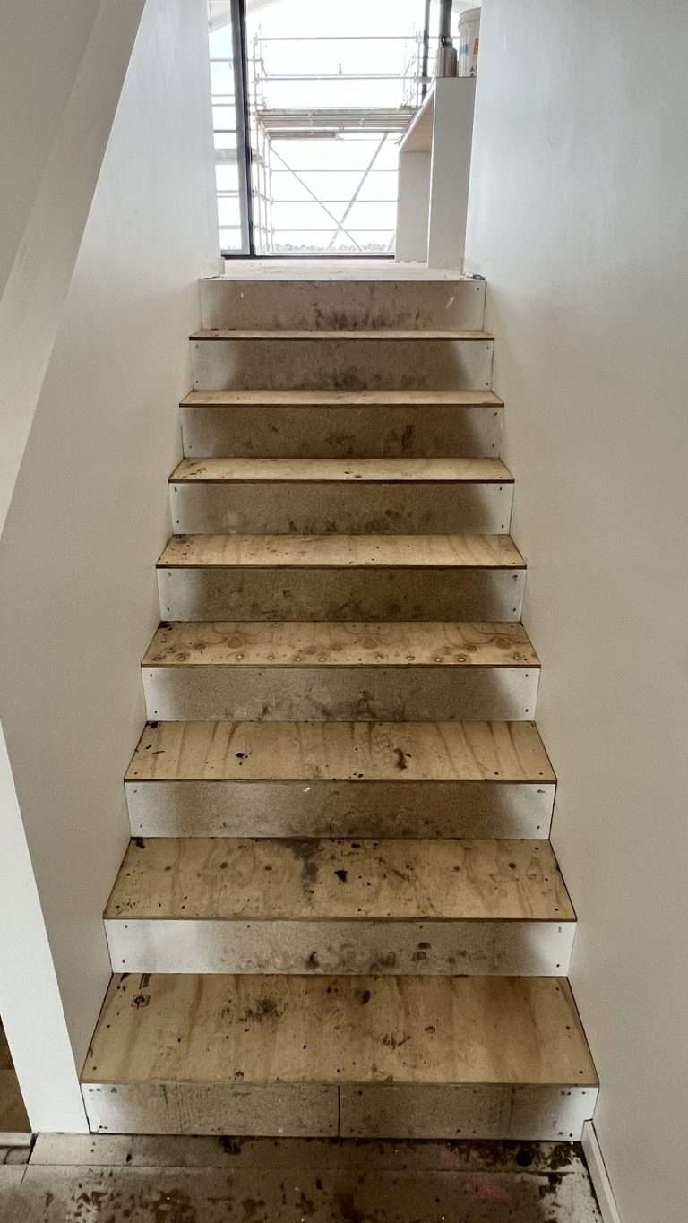 Original staircase before vinyl plank flooring installation, showing existing surfaces prior to Top Notch Flooring renovation Warragul